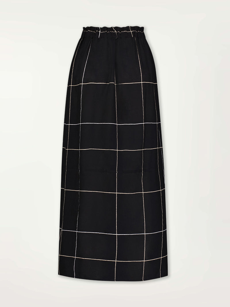 Product Back Shot of the Tola Maxi Skirt featuring Big White Plaid Patten on Black Cotton Background