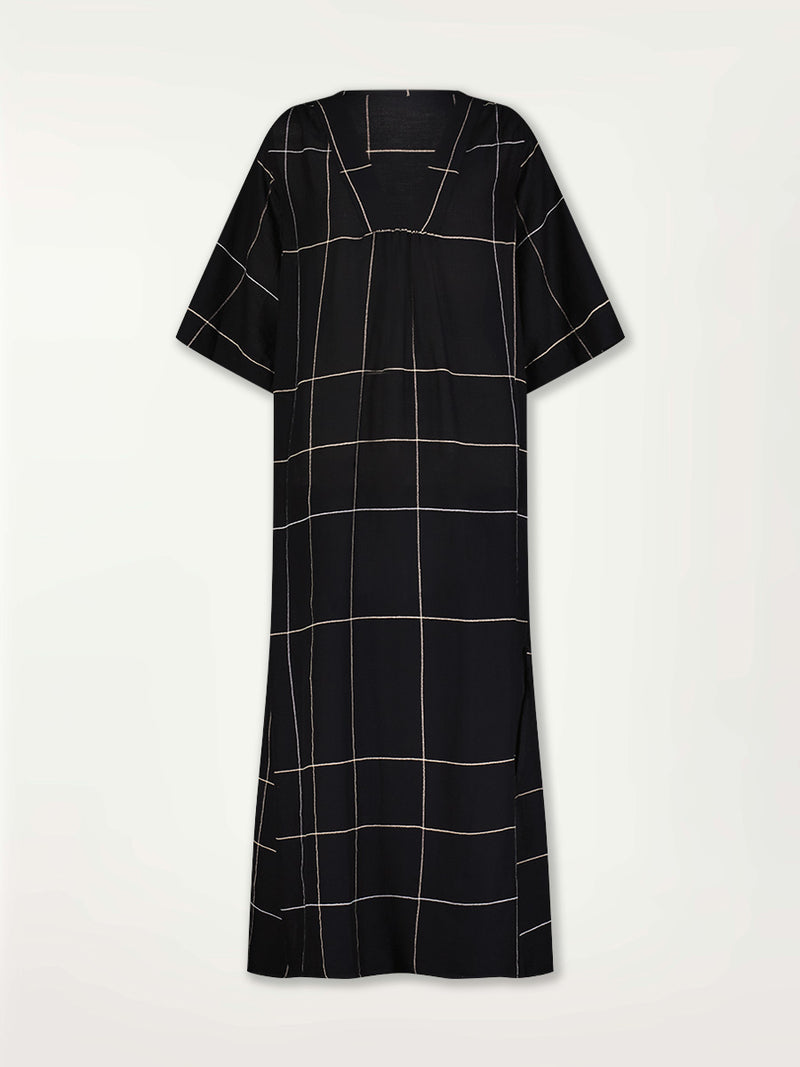 Product Front Shot of the Edna V Neck Maxi Dress featuring Big White Plaid Patten on Black Cotton Background