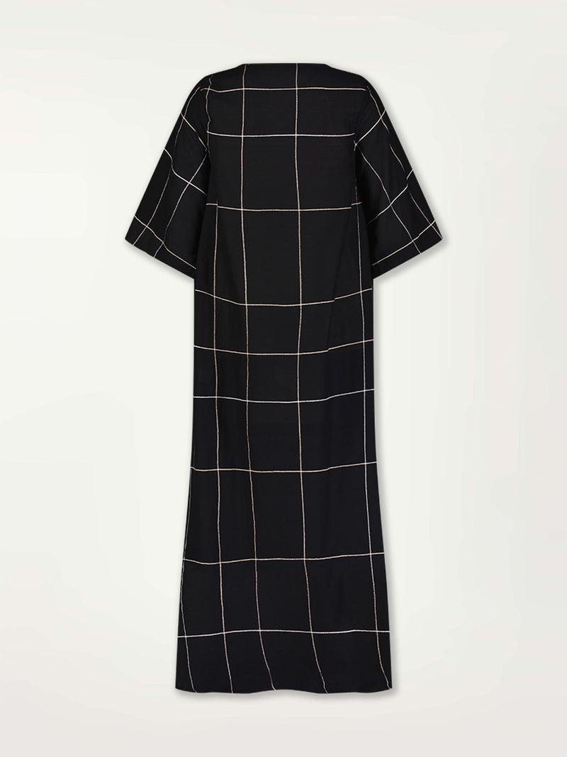 Product Back Shot of the Edna V Neck Maxi Dress featuring Big White Plaid Patten on Black Cotton Background