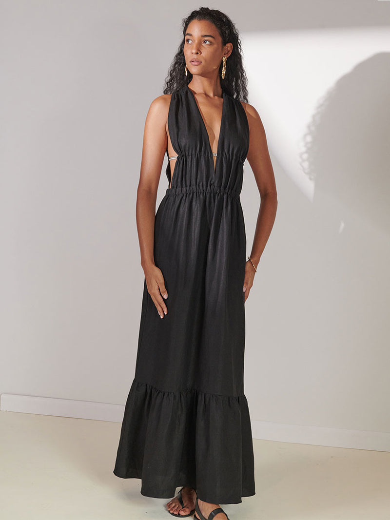 Woman Standing Wearing lemlem Lelisa V Neck Dress in Black Color 