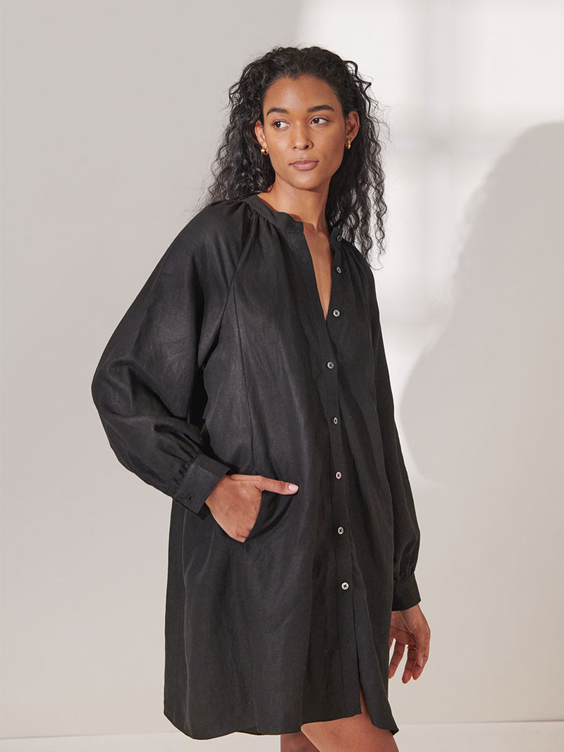 Woman Standing Wearing lemlem Meaza Button Up dress in Black Color
