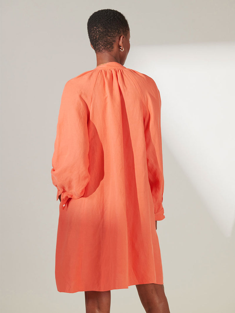 Back View Standing Wearing lemlem Meaza Button Up Dress in Coral Color