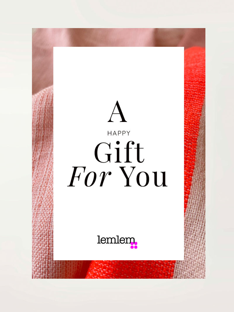 Gift card with "a happy gift for you" text, lemlem logo and close up of ayele blush fabric on the background