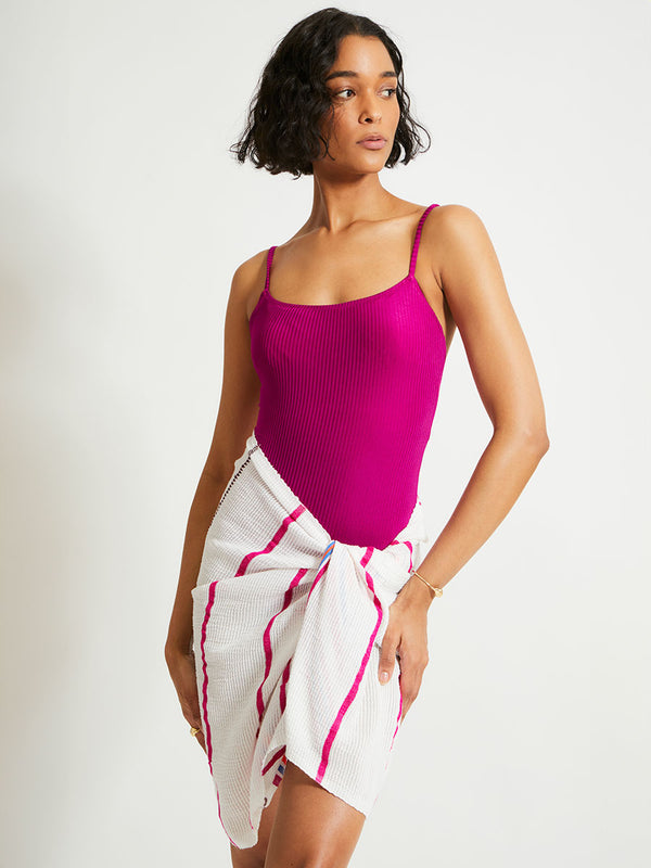 Woman Standing Wearing lemlem ELENE One Piece featuring rich, opulent berry color