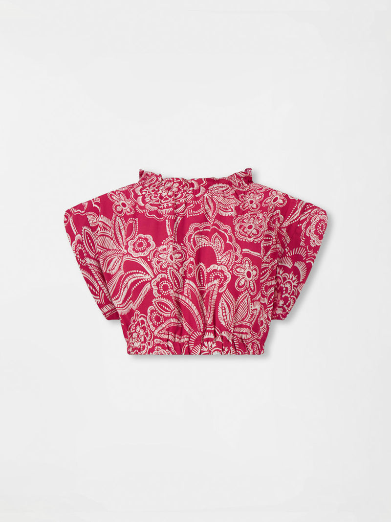 Product front shot of  lemlem MUNA Crop Top  featuring rich burgundy fabric with white leaf print