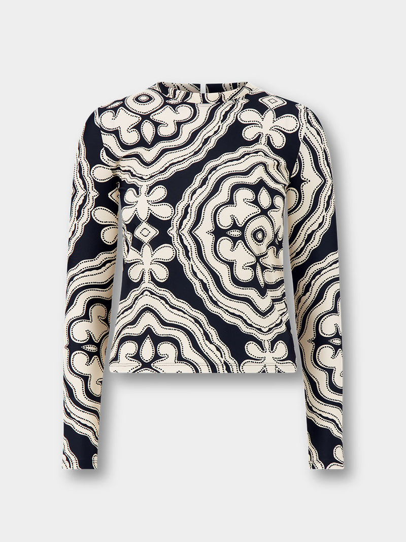 Product front shot of AZEB Rashguard featuring ancient inspired pattern in creamy ivory perfectly grounded by rich black for a striking and timeless look.