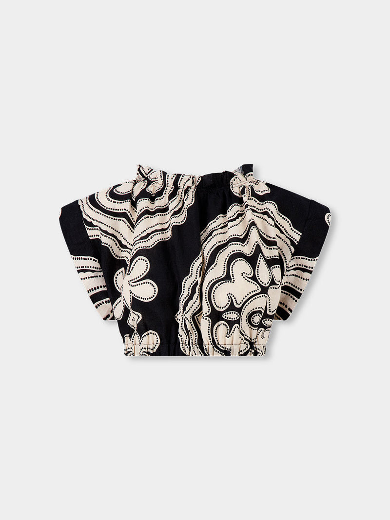 Product front shot of MUNA Crop Top featuring ancient inspired pattern in white color on black background