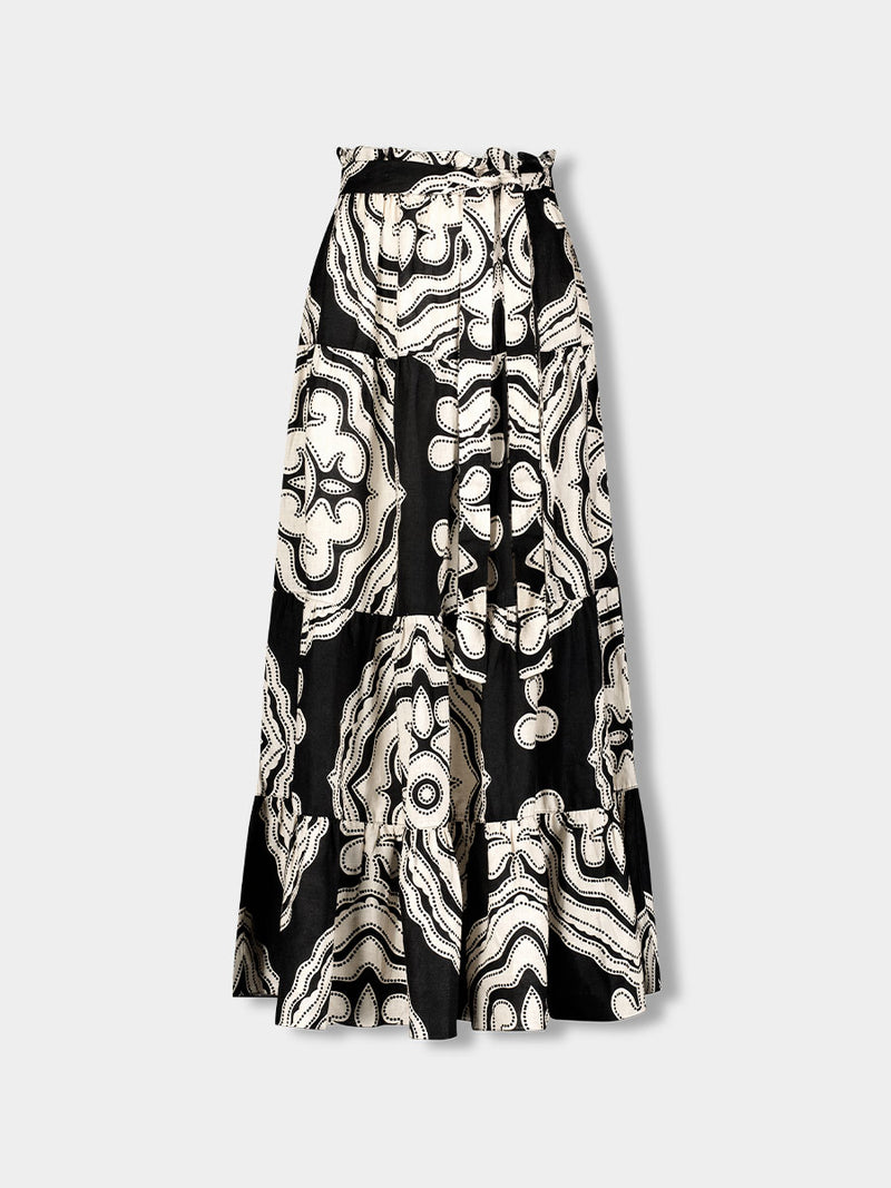 Product front shot of SANAA Skirt featuring ancient inspired pattern in white color on black background