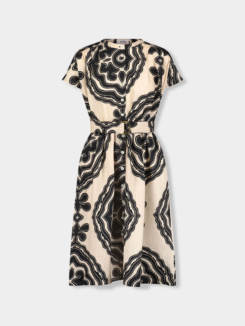 Product front shot of  lemlem HERAT Dress featuring ancient inspired pattern in black color on cream background and beige denim shorts