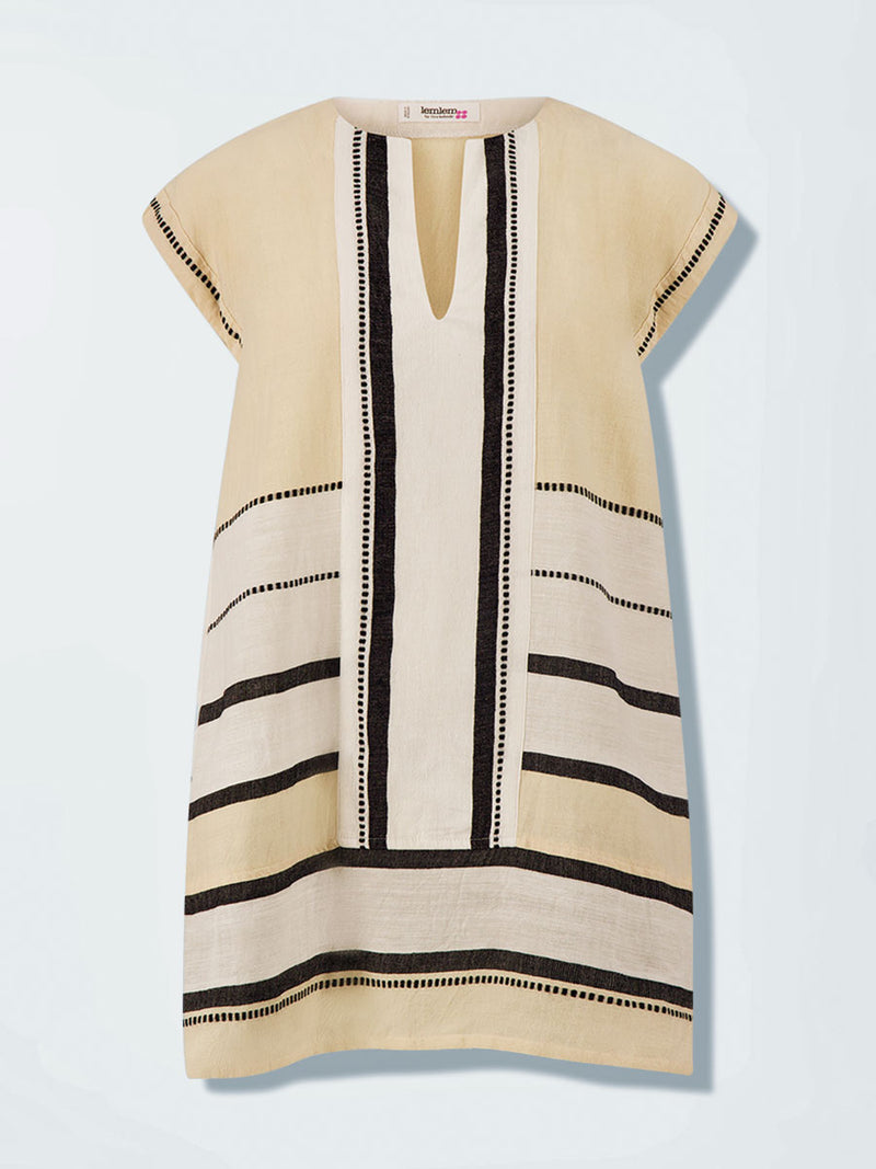 Product front shot of ELINA Caftan featuring  refined palette of crisp white, soft cream, and deep black