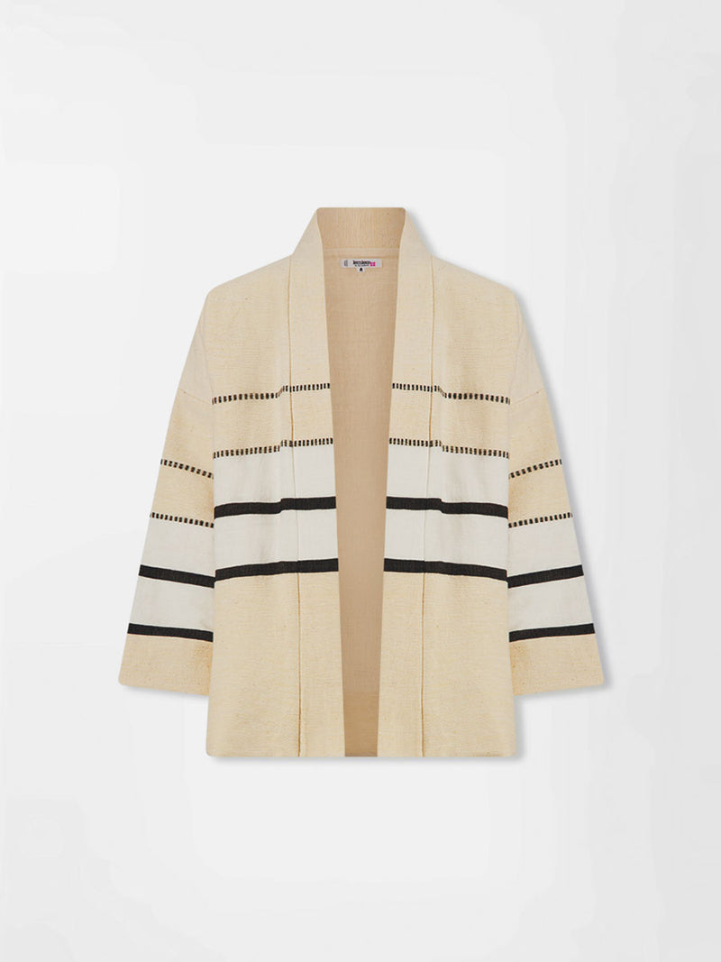 Product front shot of  lemlem handwoven TERARA Jacket featuring  refined palette of crisp white, soft cream, and deep black