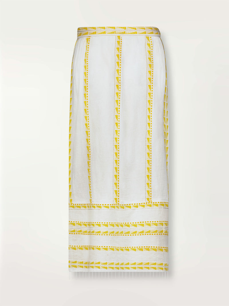 Product shot of the Abeba Wrap Skirt featuring the yellow signature Tibeb pattern and gold lurex highlights on a white background.