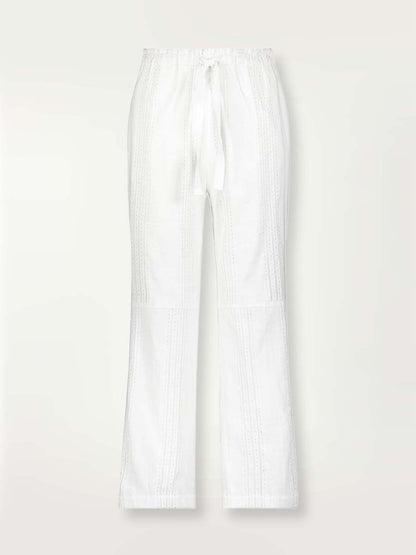 Product-shot white Abira drawstring pants with stitches of silver lurex