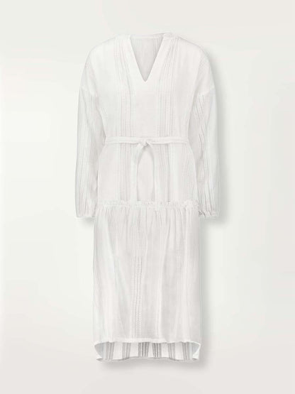Product-shot  of the front of the white Abira poet long shirt dress with waist tie and stitches of silver lurex