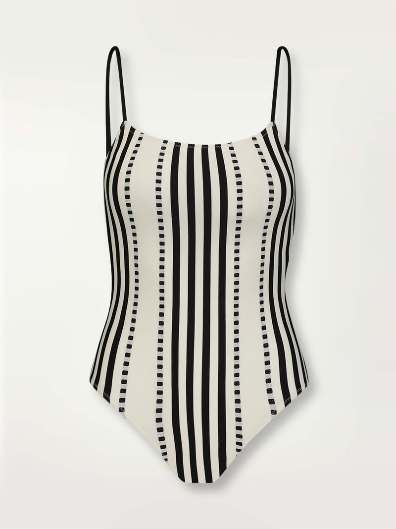 Product shot of the Eshe Classic One Piece featuring architectural and textured black stripes and dotted lines on an off white background.
