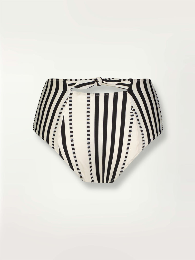 Product shot of the back the Eshe High Waist Bikini Bottom featuring architectural and textured black stripes and dotted lines on an off white background.