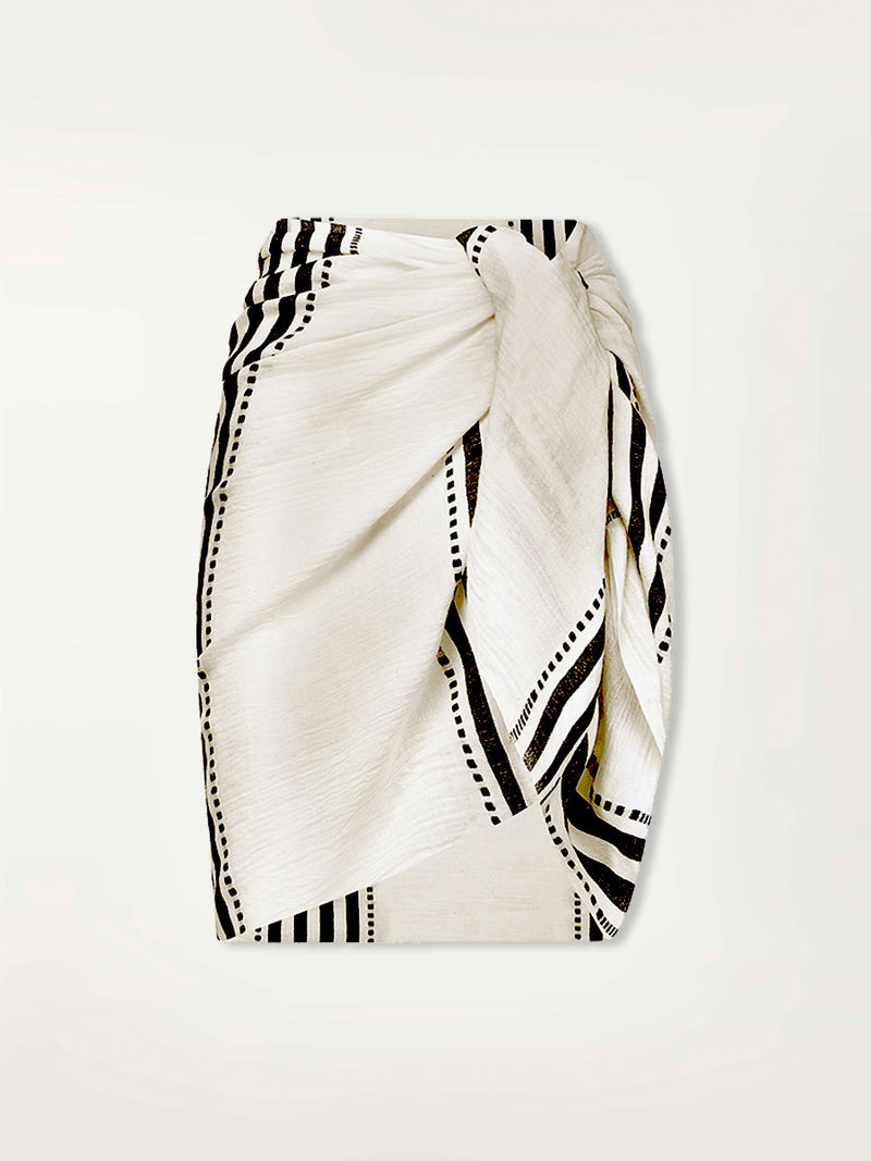 Product shot of the Eshe Sarong featuring architectural and textured black stripes and dotted lines on an off white background.