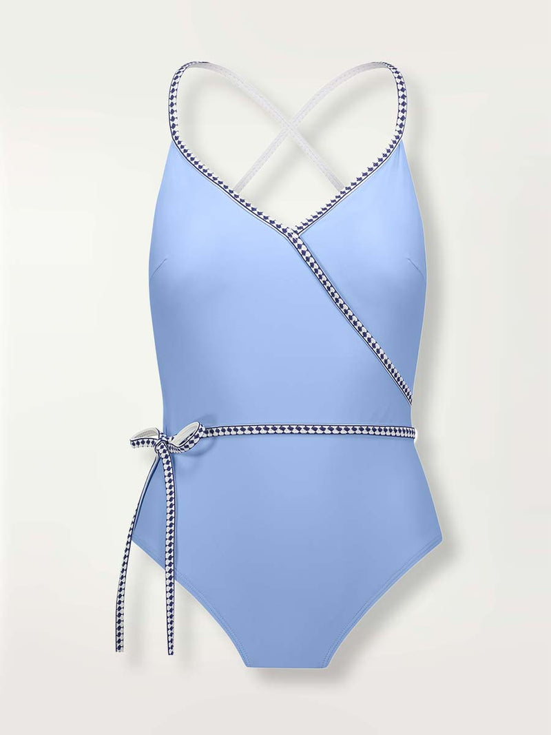 Product-shot of the front of the lena ballet one piece in sky blue with white and navy blue trim.