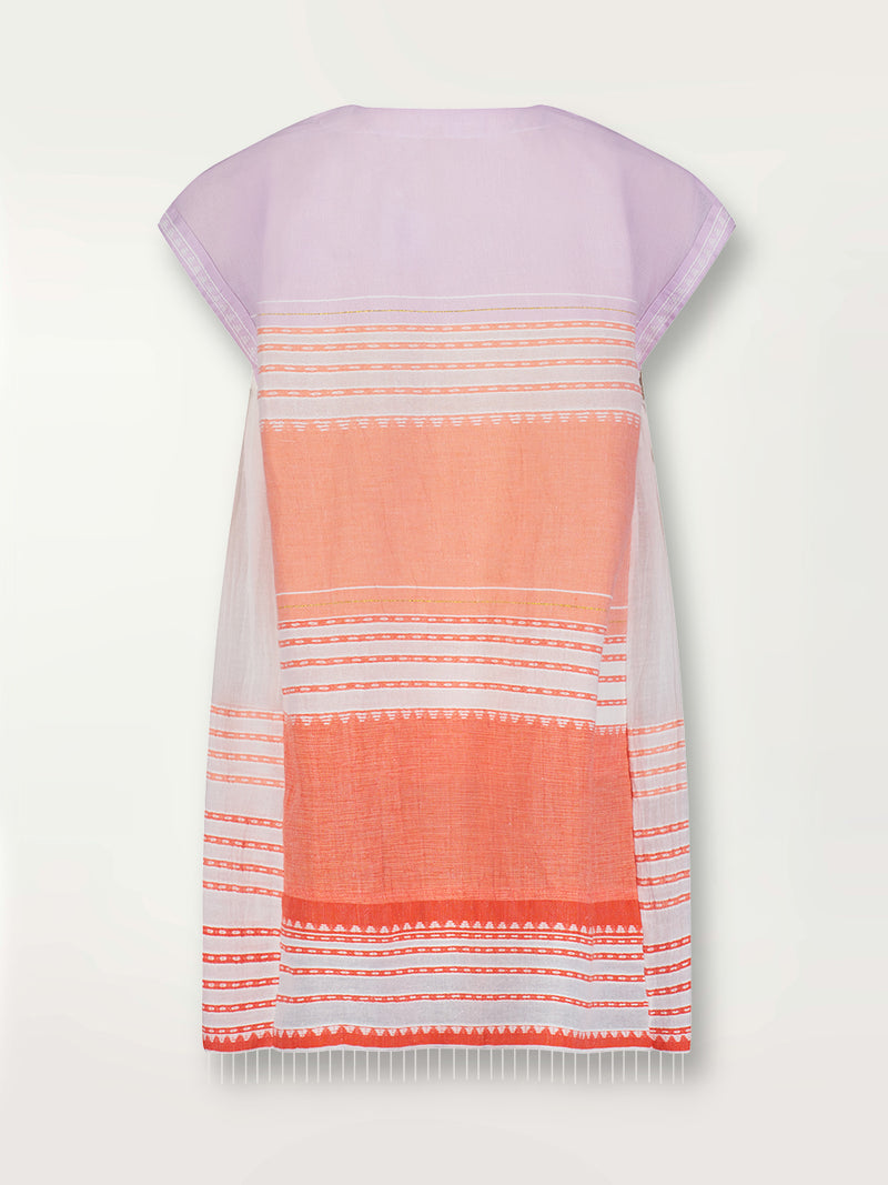 Product shot of the back the Eshal Caftan Dress featuring white doted stripes with gradiant orange and tangerine bands on a lilac and white background.