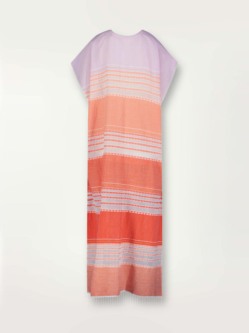 Product shot of the back the Eshal Caftan Dress featuring white doted stripes with gradiant orange and tangerine bands on a lilac and white background.