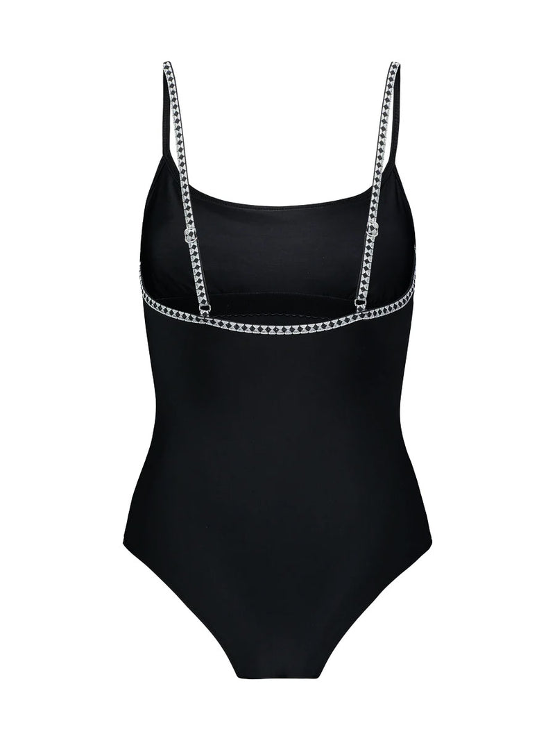 Product-shot of the back of the Lena Classic One Piece in Black featuring a black and white tibeb trim.