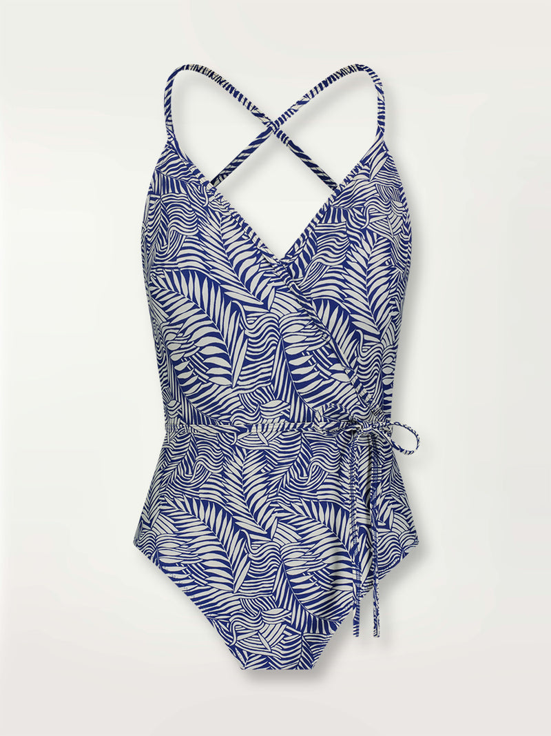Product shot of the Palm Leaf Ballet One Piece featuring palm tree patterns on a rich blue background.