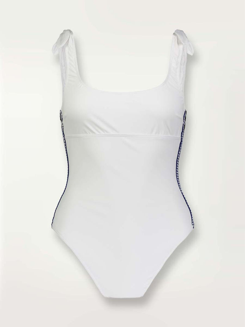 Product shot of the front of a Sofia Nageur white one piece swimsuit with graphic diamond trim