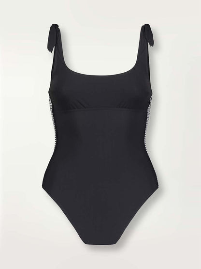 Product shot of the front of the Sofia Nageur one piece swimsuit in black with graphic diamond trim