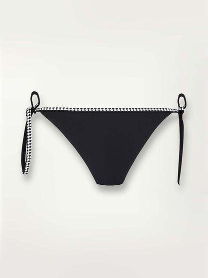 product shot of the Sofia string bikini bottom in black with graphic white diamond trim