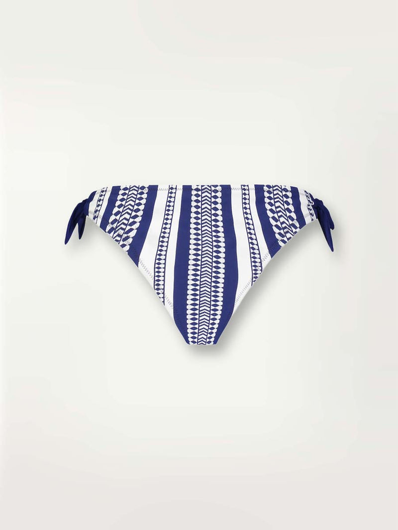 Side Tie Bikini bottom in navy blue with graphic white diamond and arrows.