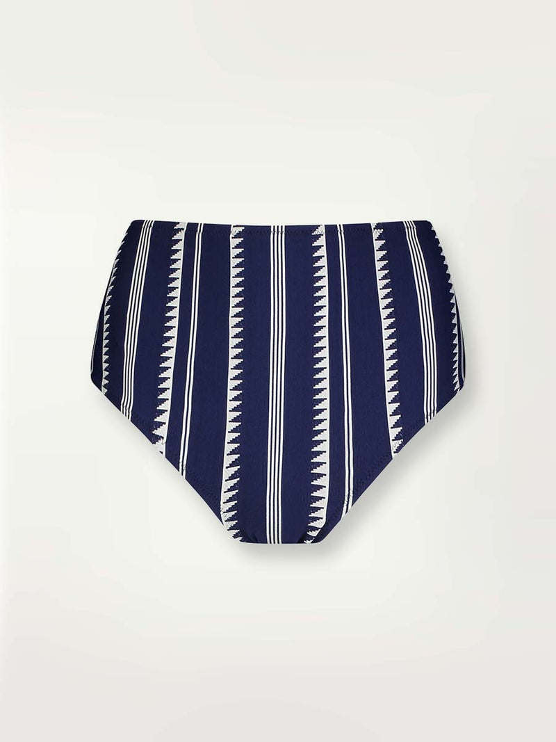 Product shot of a navy Nunu high waist bikini bottom with white triangles and stripes