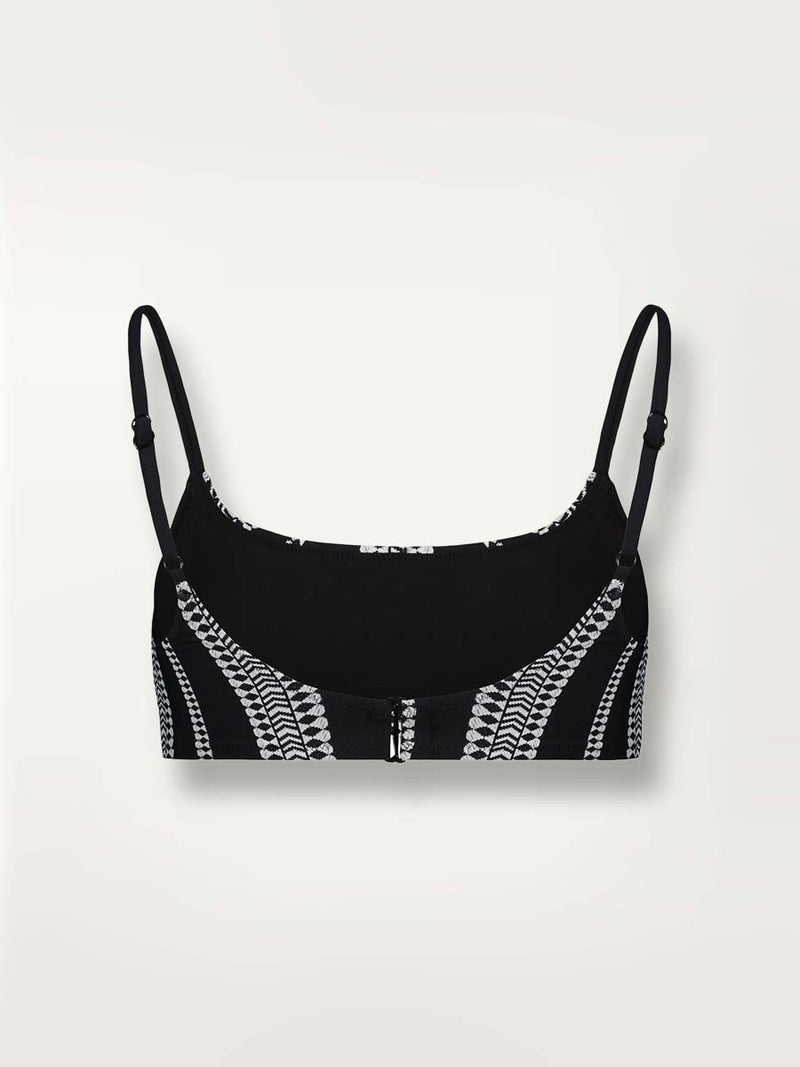 Product shot of the back of the Luchia Bralette in black with white stripes and black diamond pattern.
