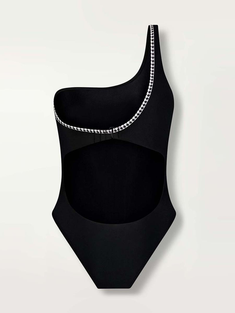 Product shot of the back of the Lena One Shoulder One Piece in Black featuring a black and white tibeb trim.
