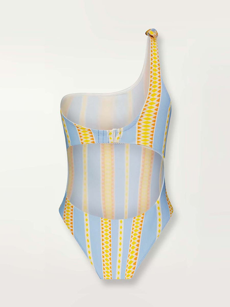 Product shot of the back of the Jemari One Shoulder One Piece in sky blue featuring yellow and orange diamond patterns.