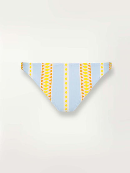 Product shot of the front of the Jemari Brief Bikini Bottom in sky blue featuring yellow and orange diamond patterns.