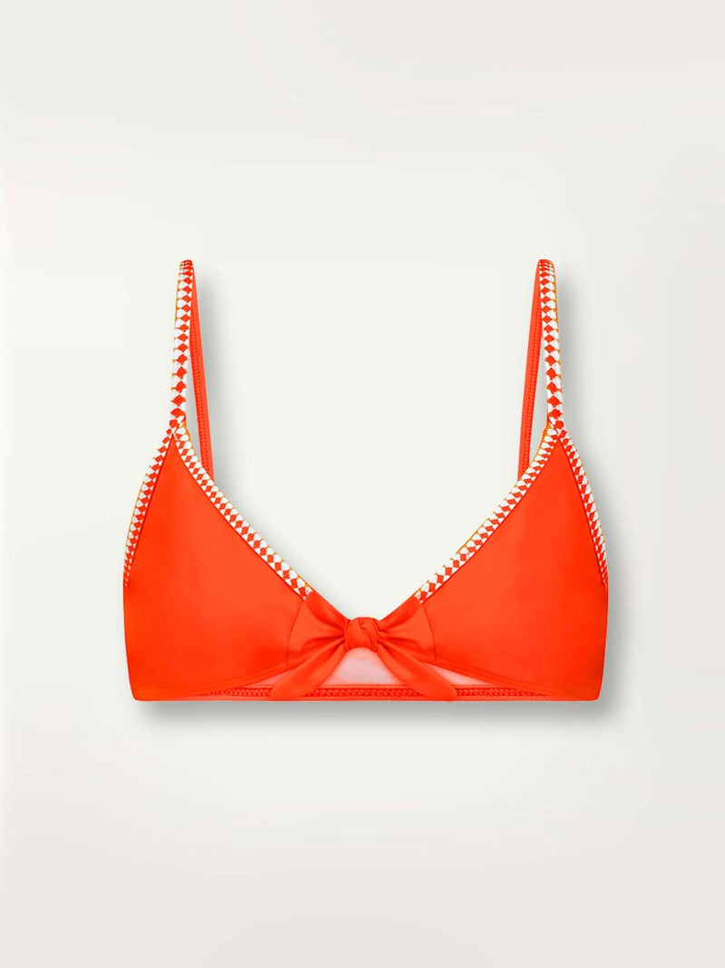 Product-shot of the front of the Lena Tie Front Top in Neon Orange featuring white and orange tibeb trim.