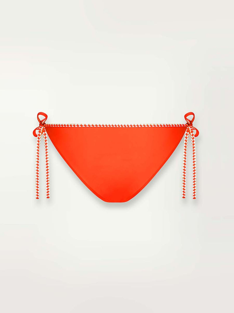 Product shot of the back of the Lena String Bikini Bottom in Neon Orange featuring white and orange tibeb waist ties