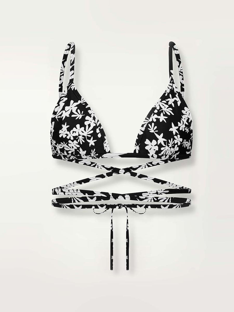Product shot of the front of the Sea Floral Wrap Traingle Top in black featuring white allover floral print
