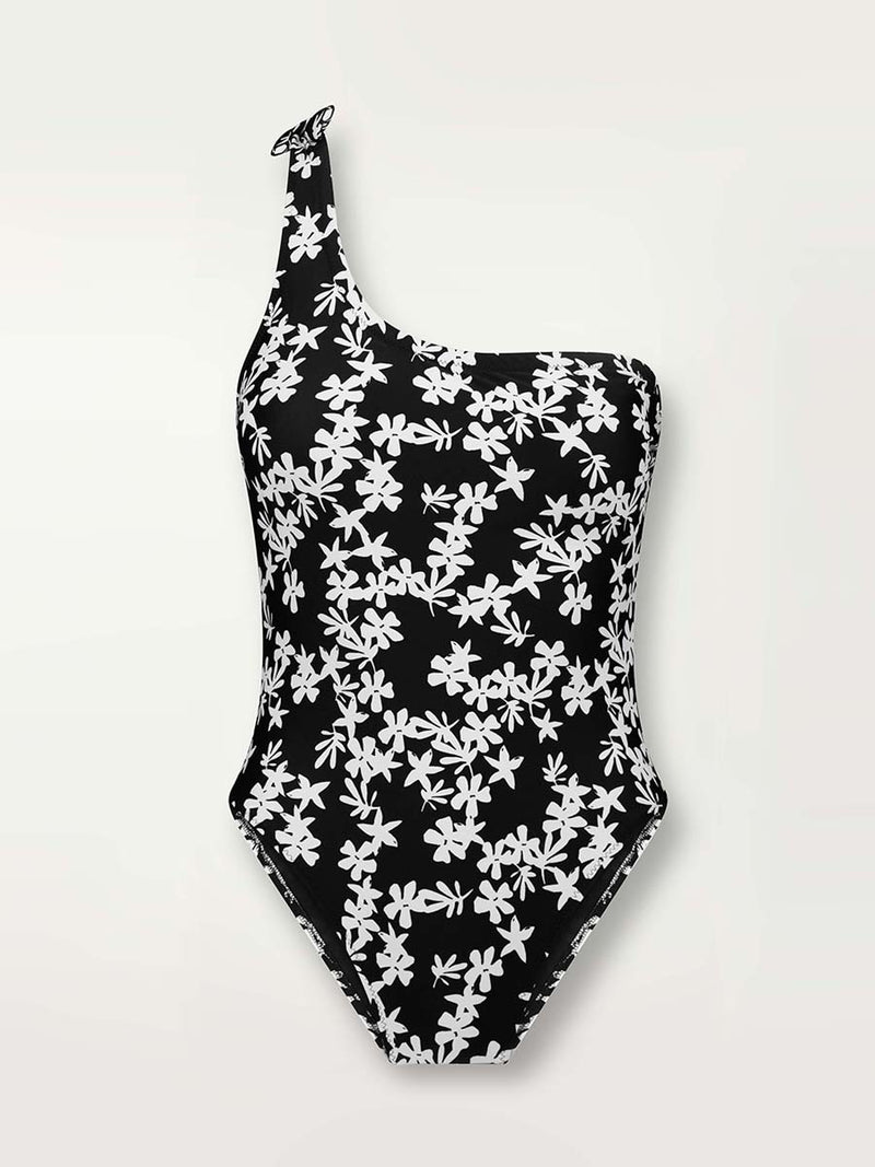 Product shot of the front of the Sea Floral One Shoulder One Piece in black featuring white allover floral print.