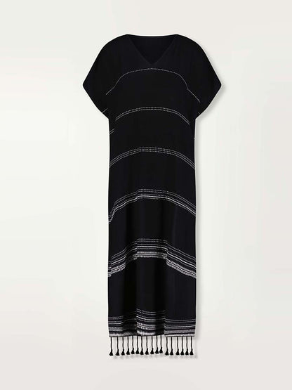 Product shot of the front of the Leliti Classic Caftan in Black with white stitching allover.