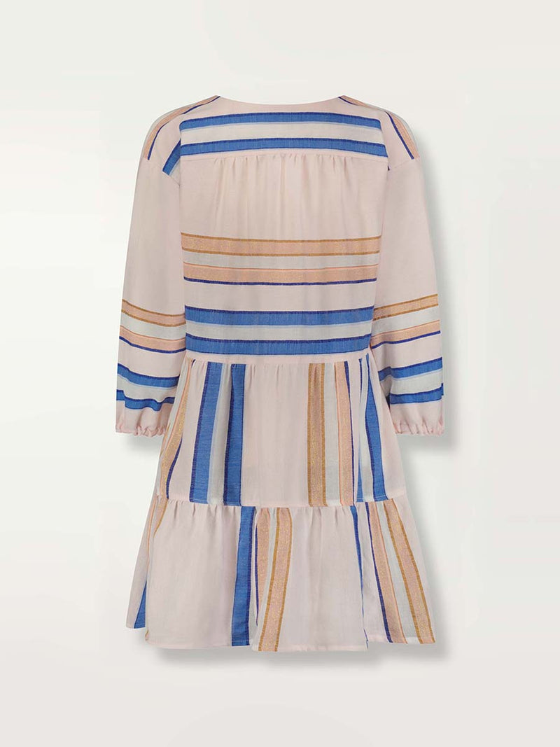 Product shot of the back of the Eskedar Popover Dress in Seashell featuring blue, white, brown, nude and gold lurex stripes