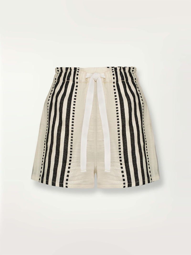 Product shot of the Eshe Shorts featuring architectural and textured black stripes and dotted lines on an off white background.