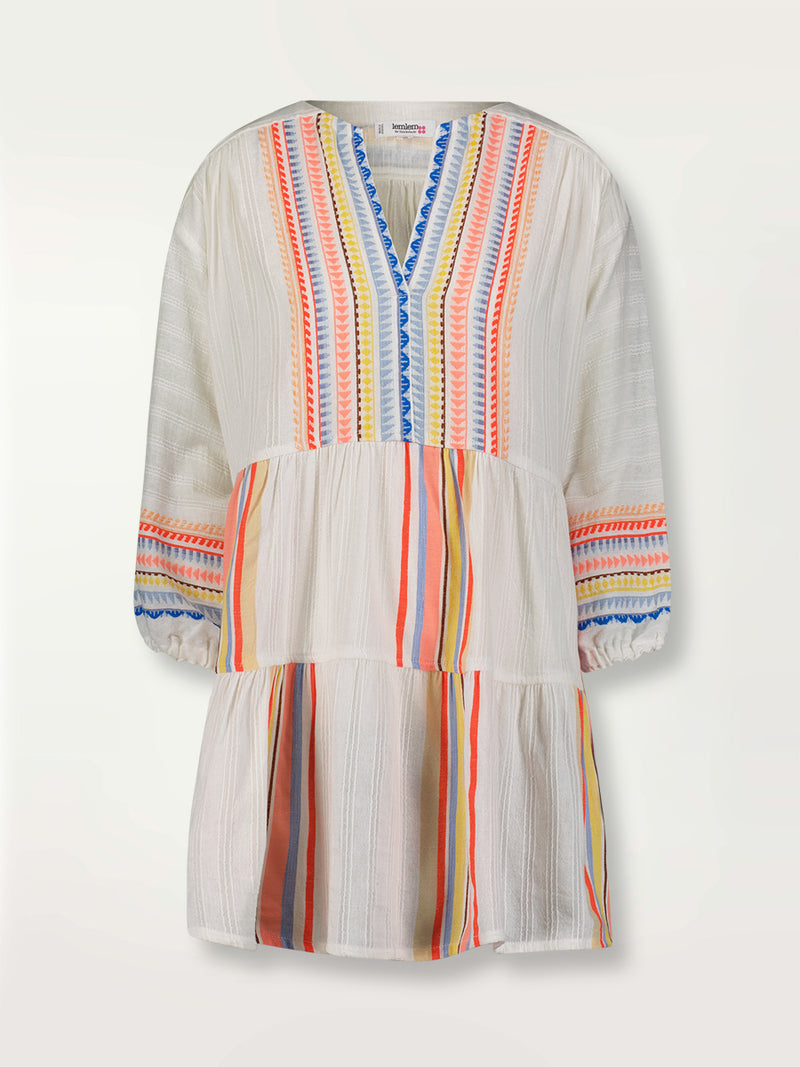 Product shot of the Bekah Popover Dress featuring 10 tutti frutti colors embroidered on a white background.  