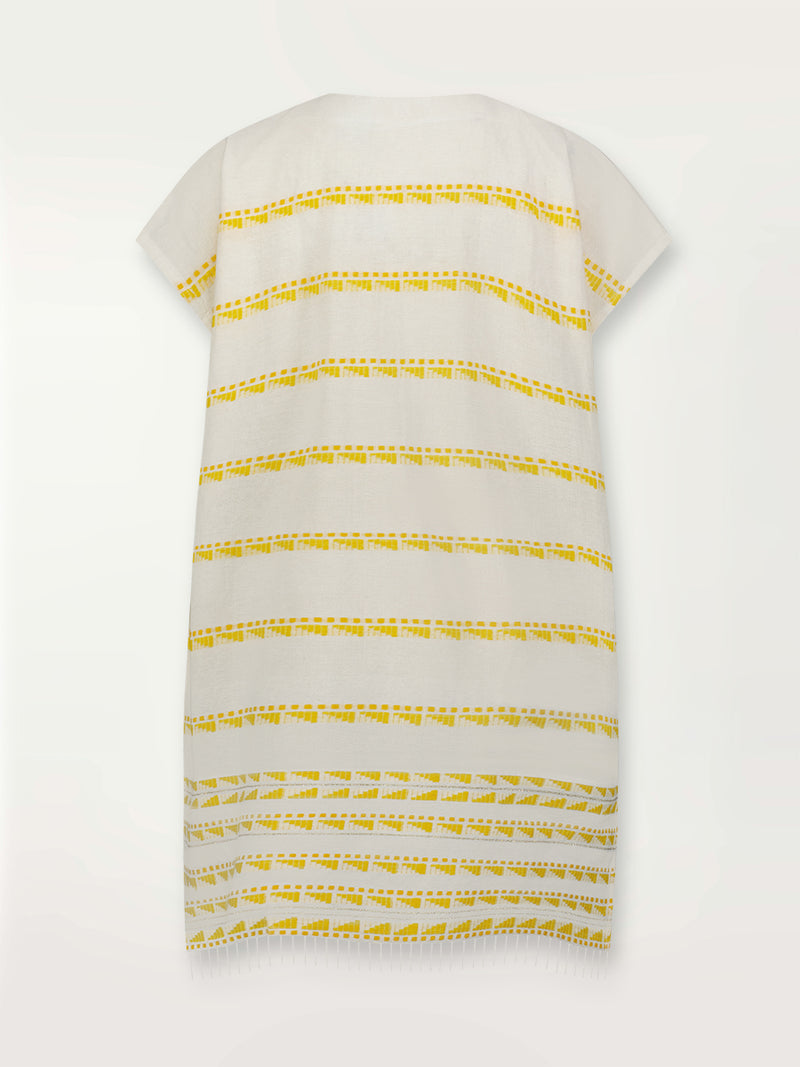 Product shot of the back the Abeba Tunic Dress featuring the yellow signature Tibeb pattern and gold lurex highlights on a white background.