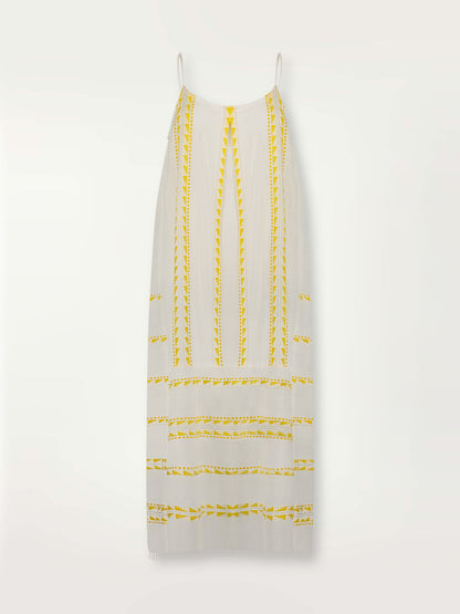 Product shot of the Abeba Slip Dress featuring the yellow signature Tibeb pattern and gold lurex highlights on a white background.