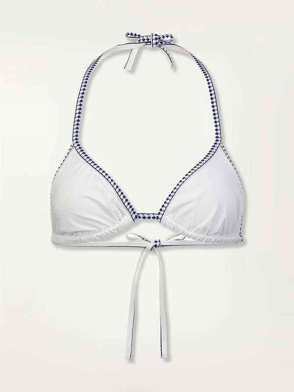 product shot of the front of the white triangle top with graphic diamond trim