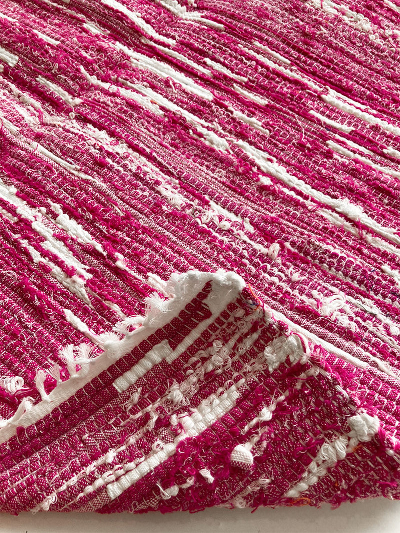 Close up shot of Magenta rug.